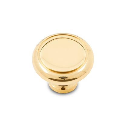 Flat brass round knob.